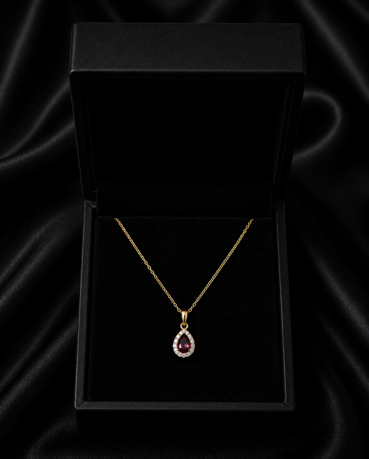 Collar dorado con circonita roja