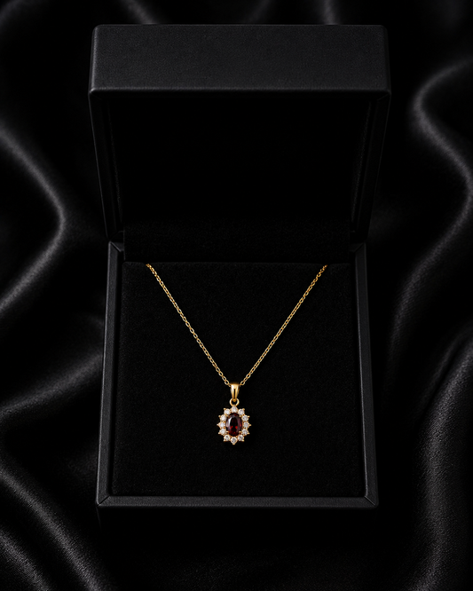 Collar dorado con circonita roja